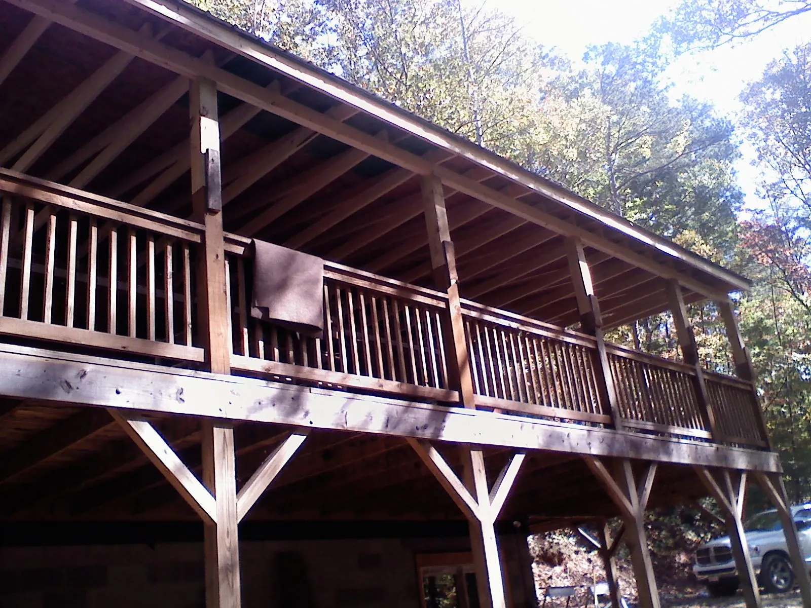 Timber framing under a new elevated porch and deck — Roof Leak Repair in Poplar Branch by Roofing Brothers
